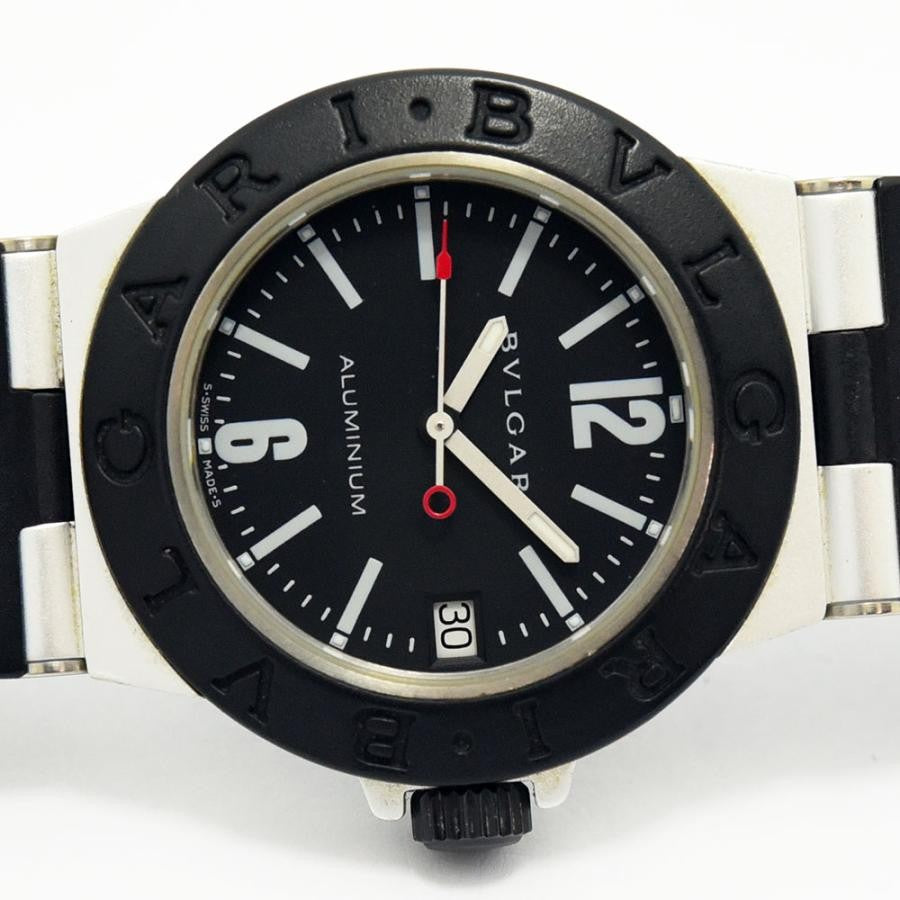 VINTAGE WATCHES FASHIONのブルガリ アルミニウム腕時計。ブラック文字盤にロゴ入りベゼルとラバーベルトを組み合わせたスポーティーなデザイン。