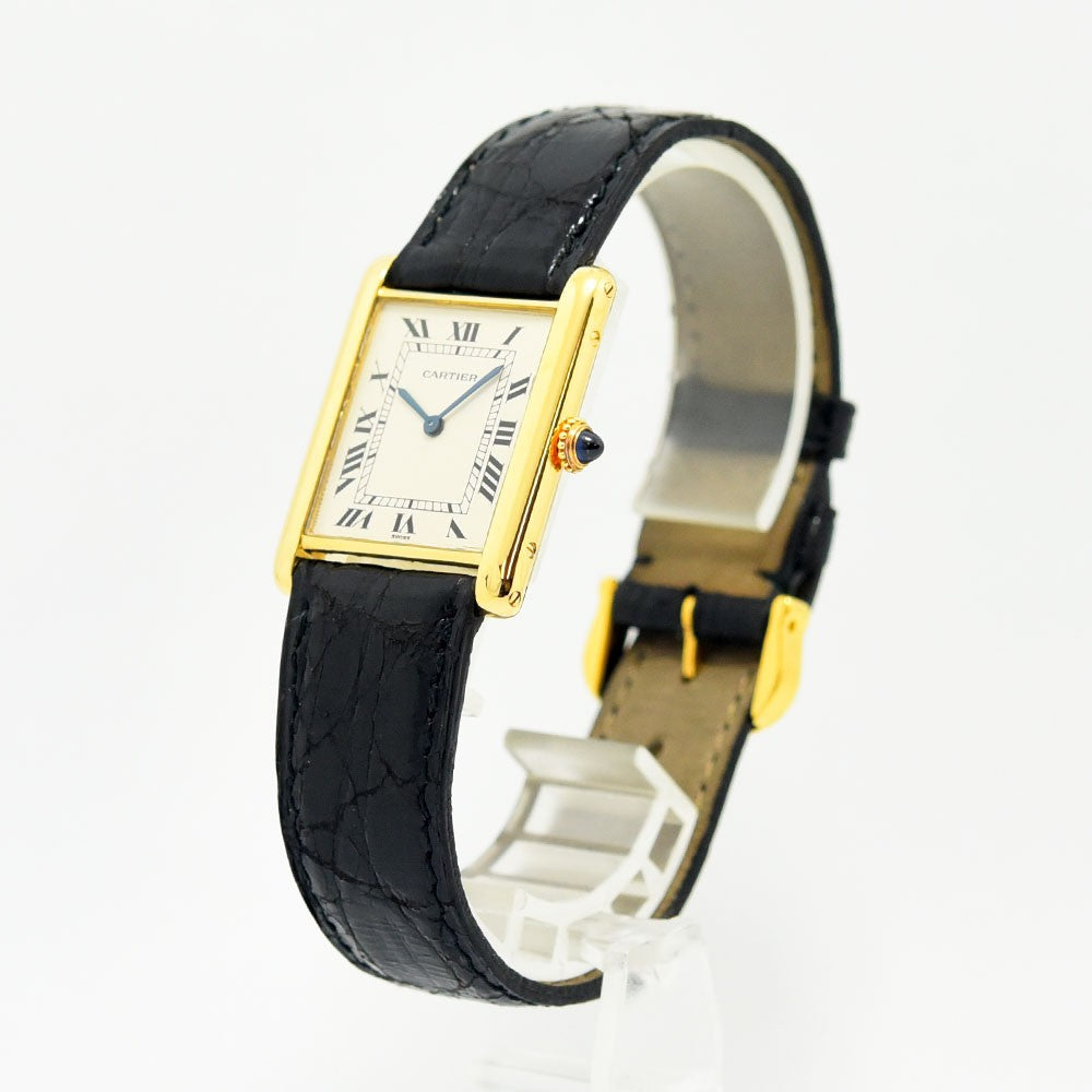 VINTAGE WATCHES FASHIONのCartier Tank Louis Cartier 18Kイエローゴールド腕時計。ブラックのアリゲーターベルトとローマ数字の文字盤が特徴。