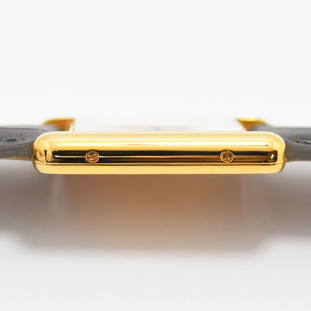 VINTAGE WATCHES FASHION カルティエ タンク レディース 腕時計。ゴールドトーンのケースとグレーのアリゲーターレザーストラップが特徴。