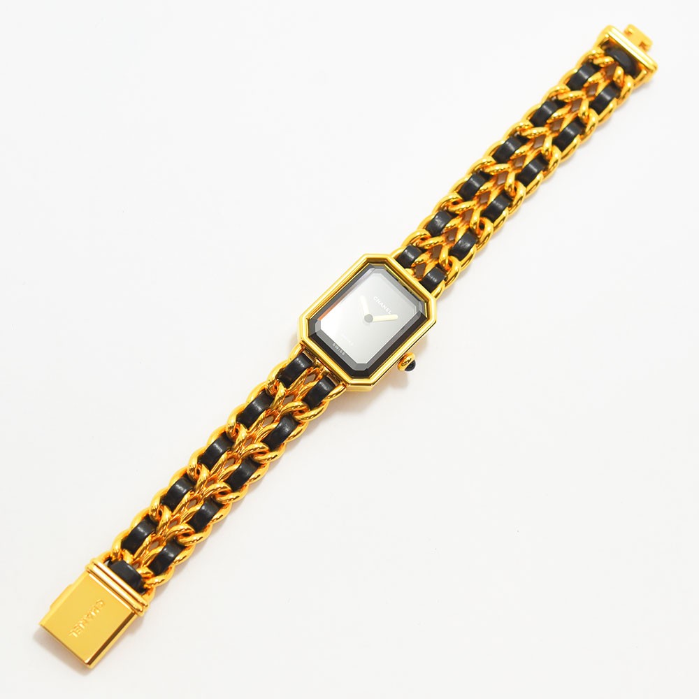 VINTAGE WATCHES FASHION シャネルのプルミエールウォッチ。ゴールドとブラックレザーのチェーンブレスレット、八角形ケース。