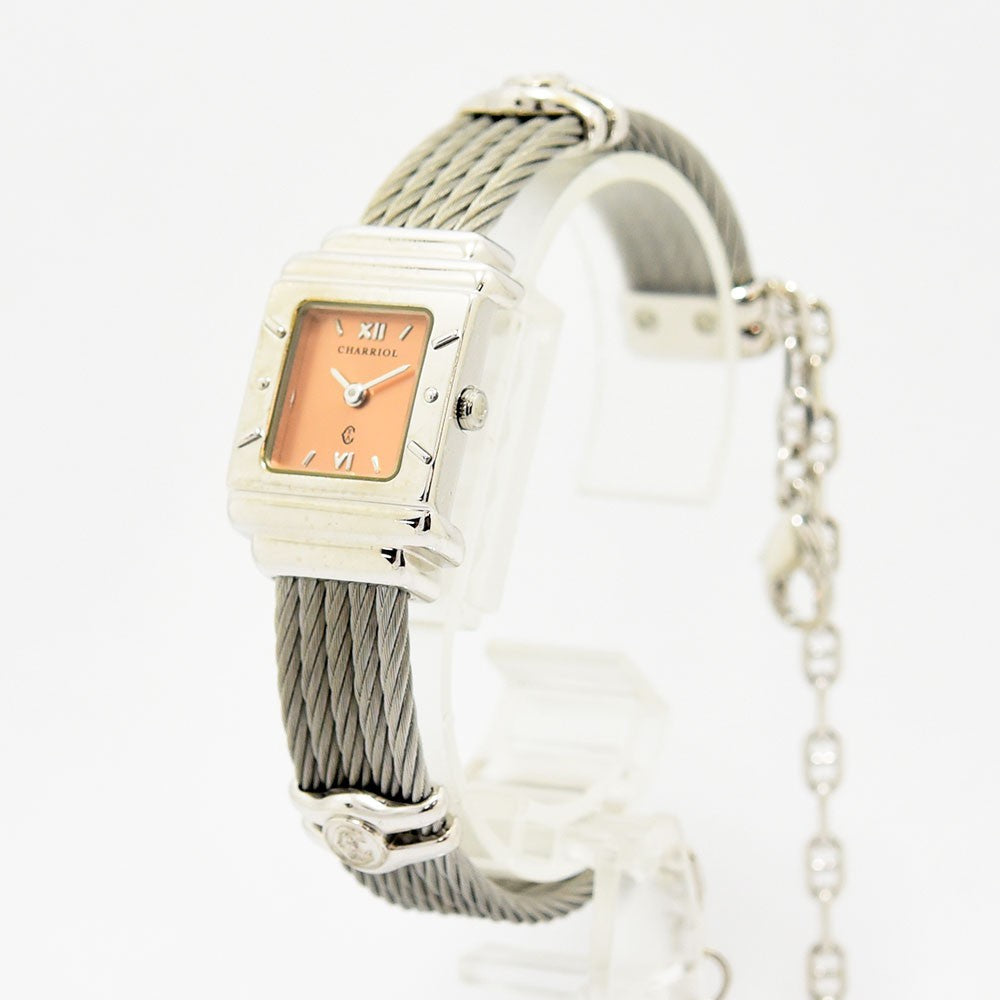 VINTAGE WATCHES FASHIONのフィリップ・シャリオール製レディース腕時計。ピーチカラーの文字盤とシルバーのワイヤーケーブルブレスレットが特徴的なスクエア型ウォッチ。