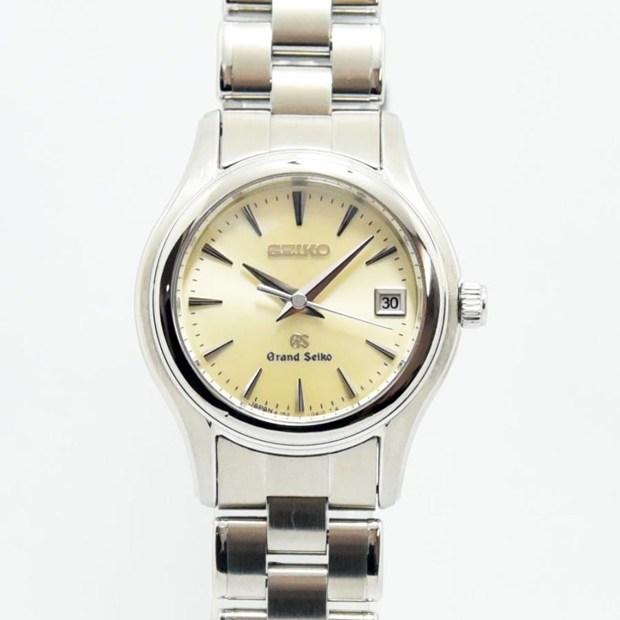 VINTAGE WATCHES FASHIONのグランドセイコーレディース腕時計。シルバーのステンレス製ケースとクリーム色の文字盤が特徴。