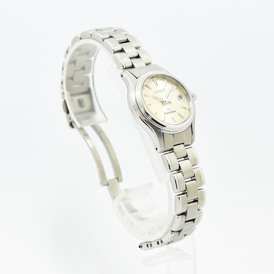VINTAGE WATCHES FASHIONのグランドセイコー製レディース腕時計。シルバーのステンレススチール製ブレスレットと上品なクリーム色の文字盤が特徴。