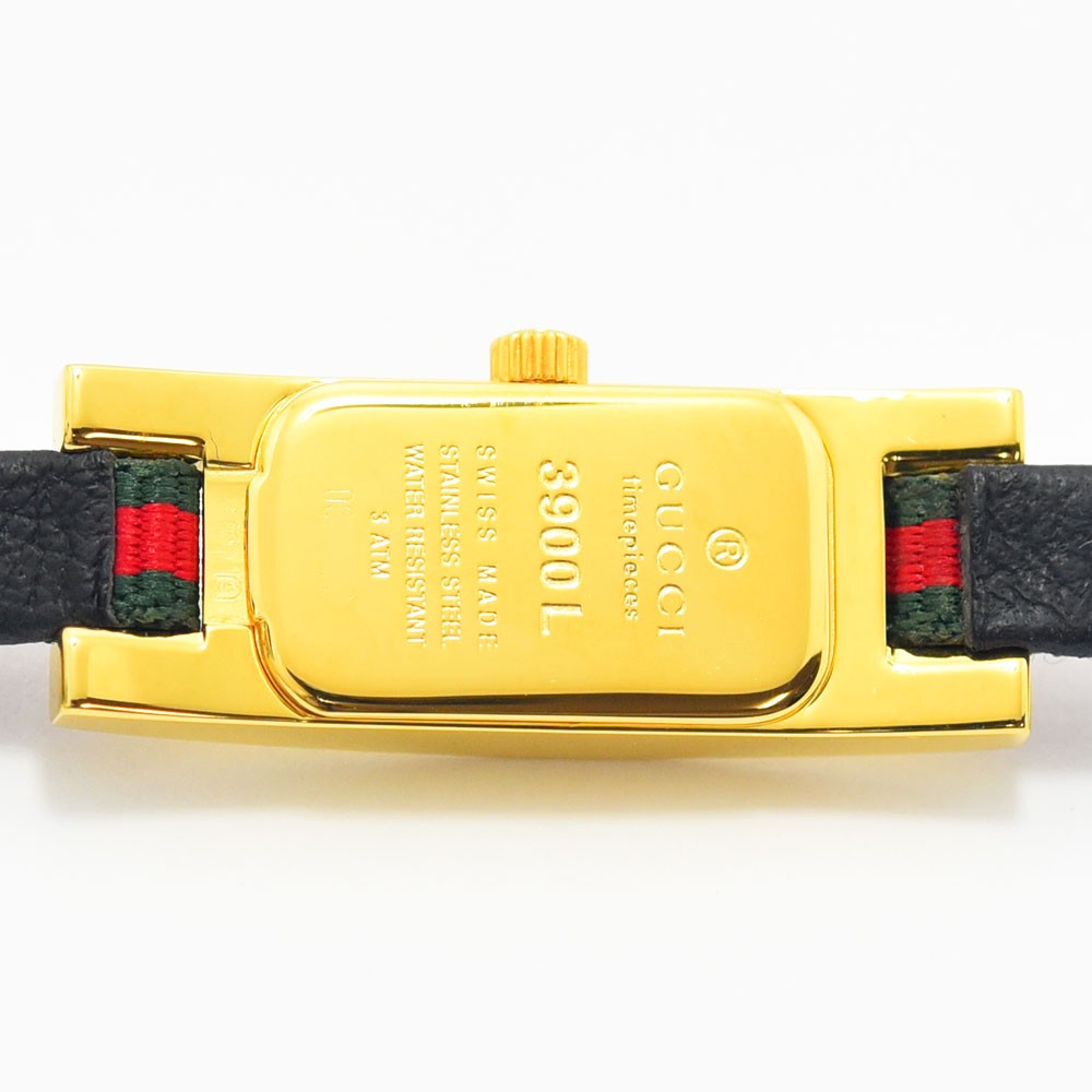 VINTAGE WATCHES FASHIONのGUCCI 3900Lレディース腕時計、ゴールドトーンの長方形ケース裏蓋とウェブストライプ柄のレザーベルト