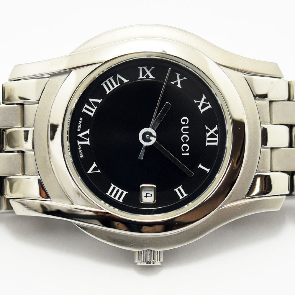 VINTAGE WATCHES FASHIONのGucci 5500Lレディース腕時計。ブラック文字盤にローマ数字と日付表示を備えたステンレススチール製。