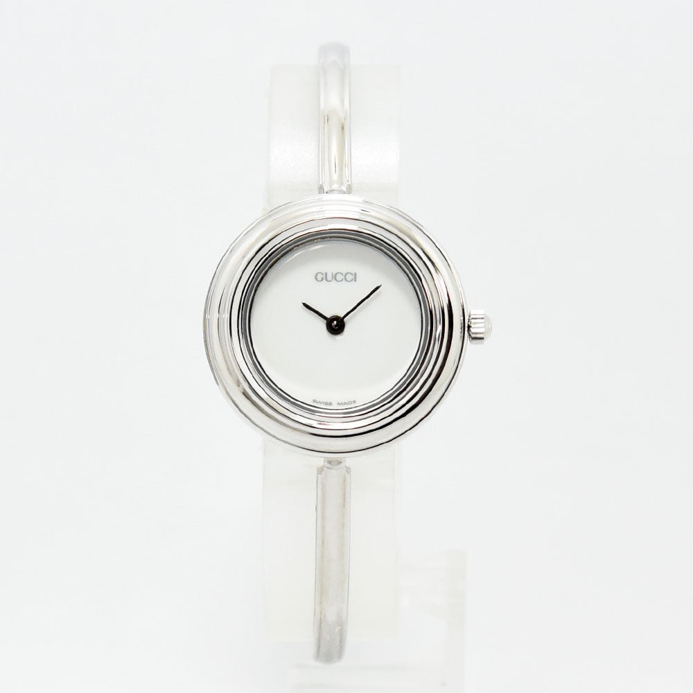 VINTAGE WATCHES FASHIONのGUCCIチェンジベゼル腕時計。ホワイト文字盤とシルバーのバングルがエレガントなレディースウォッチ。