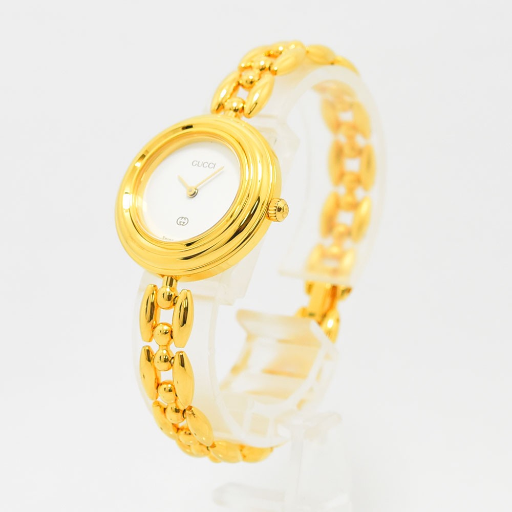 VINTAGE WATCHES FASHIONのゴールドトーンが輝くGUCCIヴィンテージチェンジベゼルウォッチ。エレガントなブレスレットデザインが特徴的