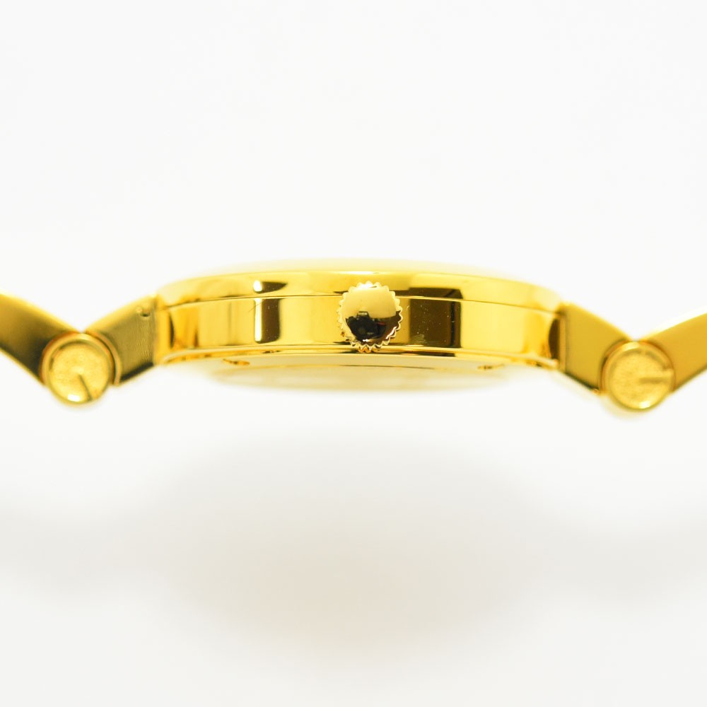 VINTAGE WATCHES FASHIONのゴールドトーンステンレススチール製GUCCIレディースバングルウォッチの側面ビュー