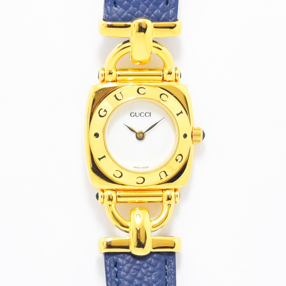 VINTAGE WATCHES FASHIONのゴールドケースとブルーレザーベルトが特徴的なグッチのレディース腕時計