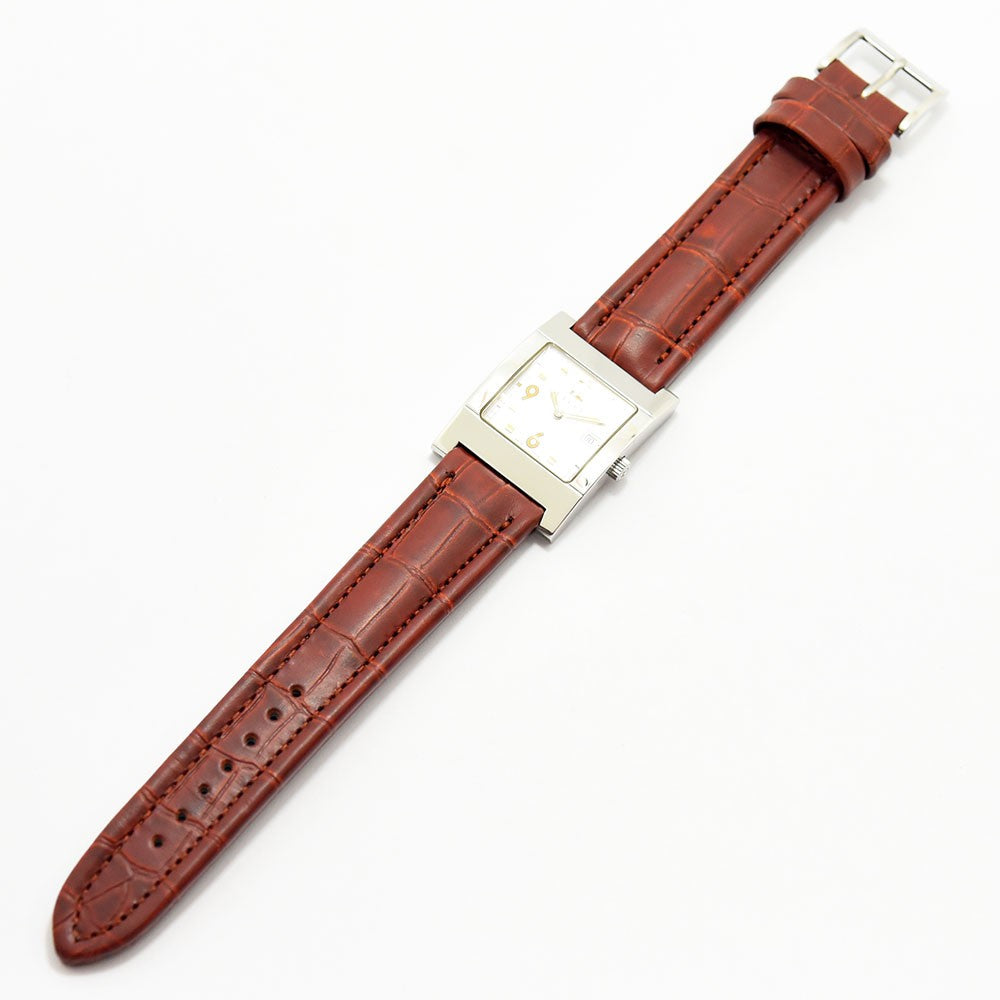 VINTAGE WATCHES FASHIONのGUCCIスクエア型腕時計。シルバーのステンレスケースとブラウンの型押しレザーベルトが特徴。
