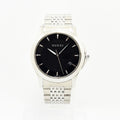 VINTAGE WATCHES FASHIONのGUCCI製ステンレススチール腕時計。ブラックの文字盤とシルバーのブレスレットが特徴的なメンズアナログ時計。