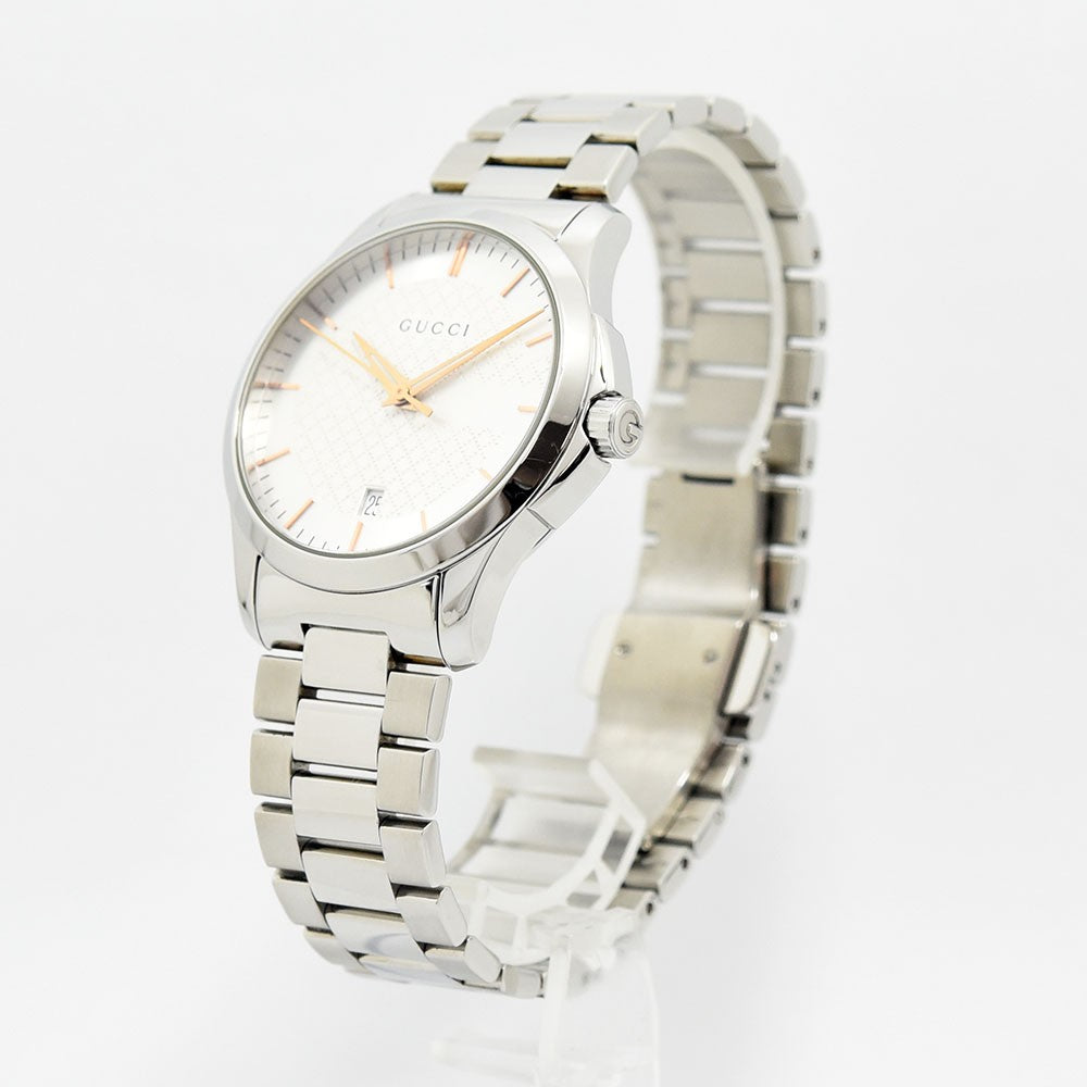 VINTAGE WATCHES FASHIONのGUCCIステンレススチール製アナログ腕時計。シルバーのバンドとゴールドの針が特徴的で、日付表示付きの洗練されたデザイン。