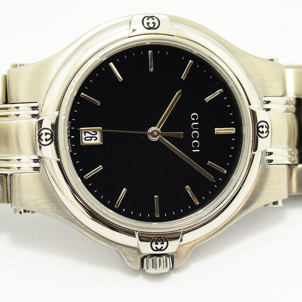 VINTAGE WATCHES FASHIONのGucciステンレススチール製腕時計。ブラック文字盤に日付表示を備えたエレガントなデザイン。