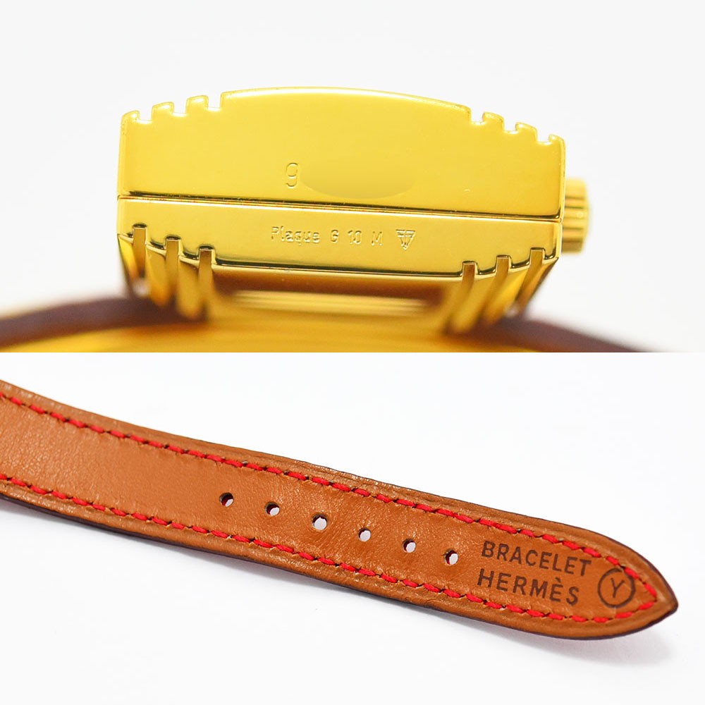 VINTAGE WATCHES FASHIONのHERMESケリーウォッチ。ゴールドの南京錠型ケースと刻印、赤いステッチが施されたブラウンレザーベルトのディテール。