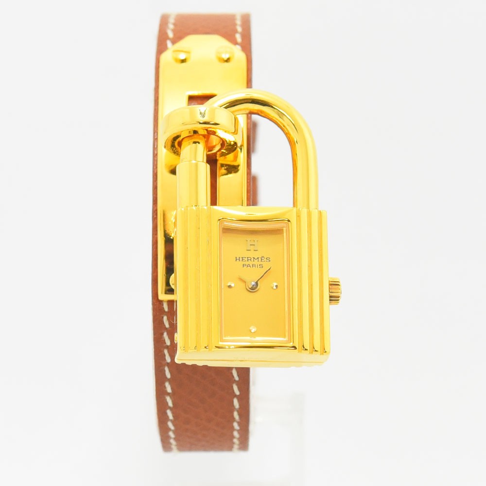VINTAGE WATCHES FASHIONのHERMESケリーウォッチ。ゴールドの南京錠型ケースとホワイトステッチ入りブラウンレザーベルトが特徴のレディース腕時計。
