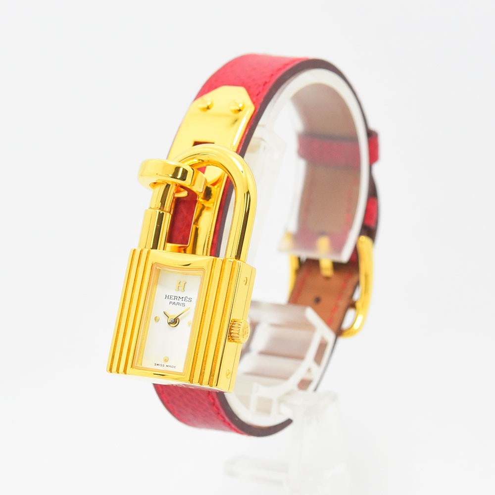 VINTAGE WATCHES FASHIONのHERMESケリーウォッチ。ゴールドの南京錠型ケースと鮮やかなレッドのレザーベルトが特徴的なレディース腕時計。