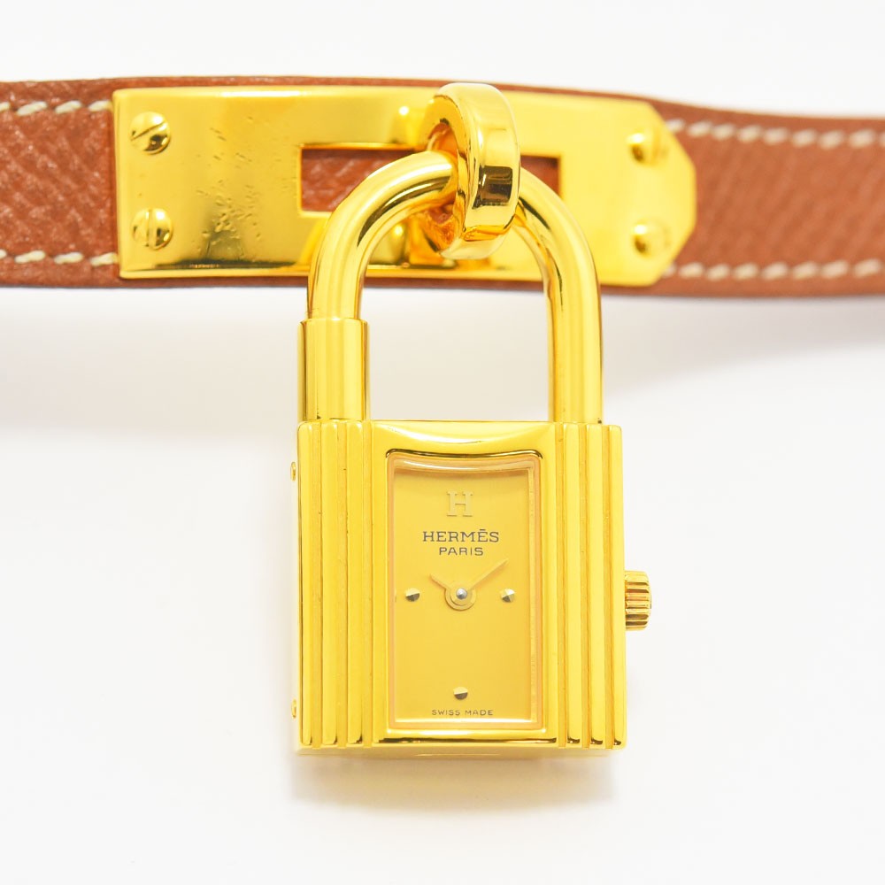 VINTAGE WATCHES FASHIONのHERMESケリーウォッチ。ゴールドのカデナ型ケースとホワイトステッチ入りブラウンレザーベルトが特徴のレディース腕時計。