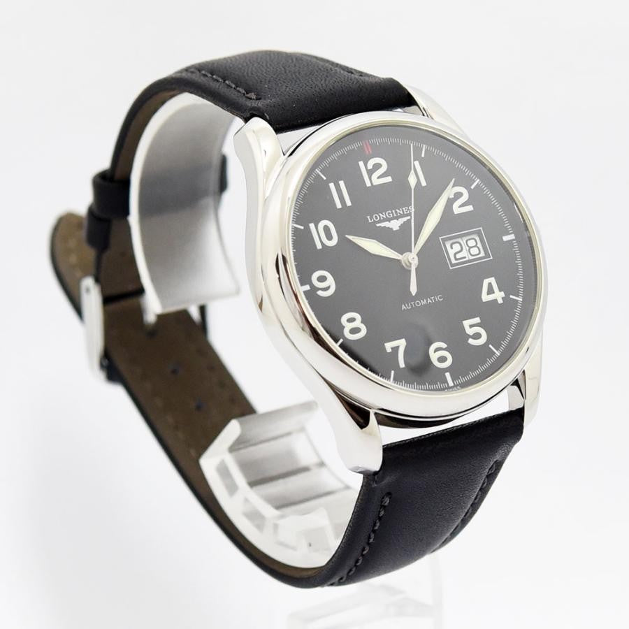 VINTAGE WATCHES FASHIONのクラシックな自動巻きメンズウォッチ。ブラックの文字盤、アラビア数字インデックス、日付表示窓、ブラックレザーベルト。