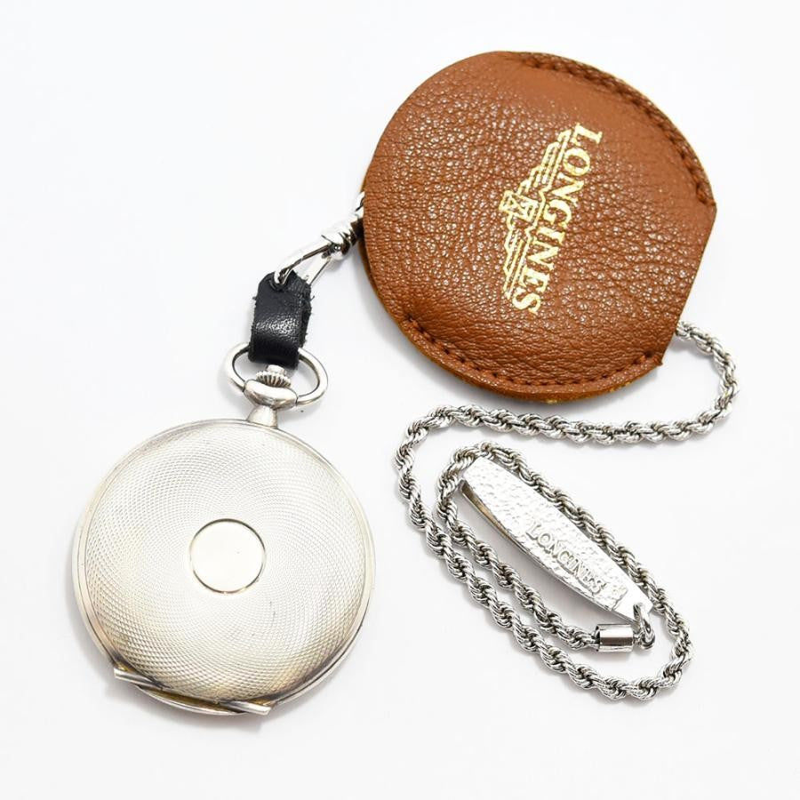 VINTAGE WATCHES FASHIONのロンジン製アウグスト・アガシ記念懐中時計。シルバーカラーのケース、ローマ数字の文字盤、ブルーの針。裏蓋にはアガシ博士の肖像と年号のエッチング。