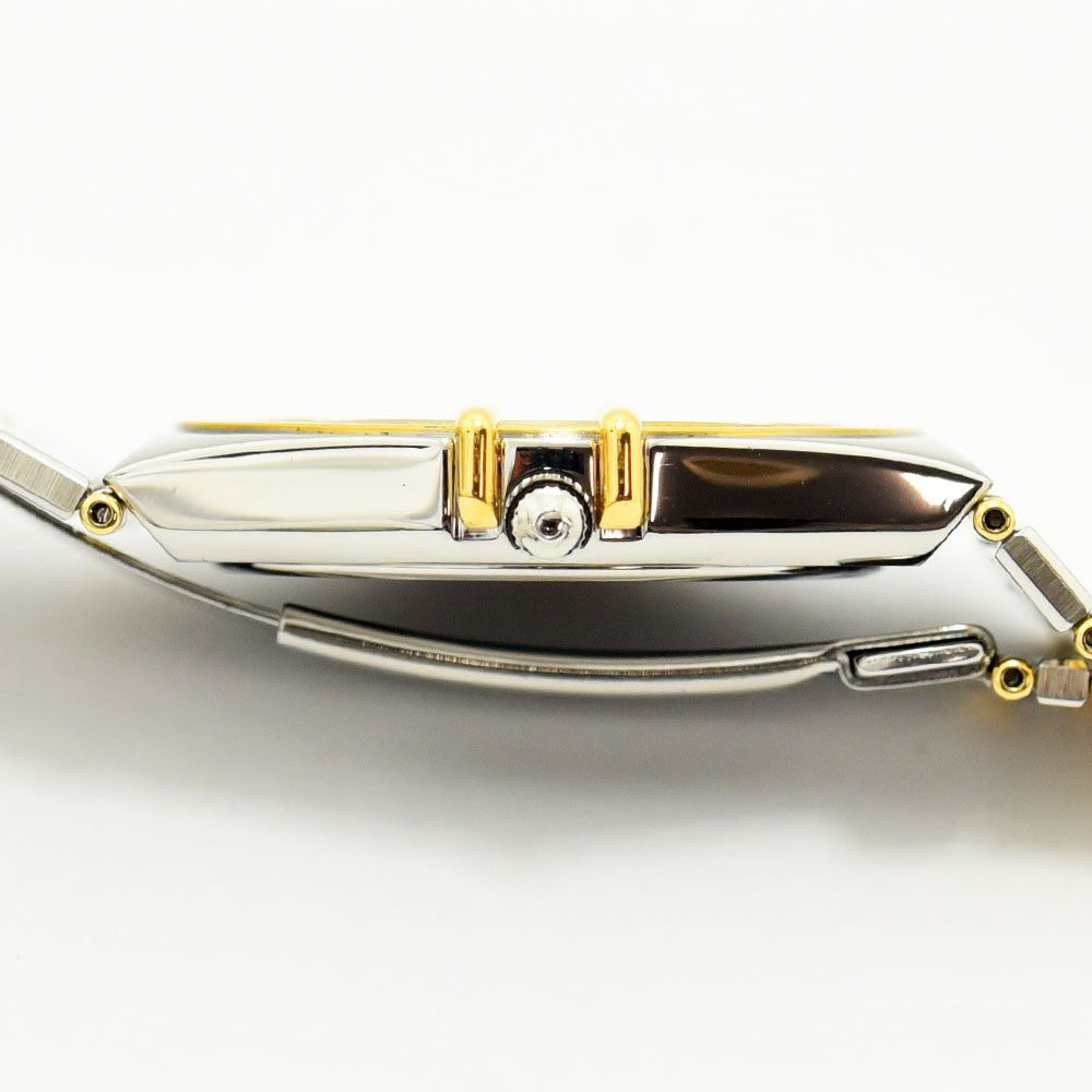 VINTAGE WATCHES FASHIONのOMEGAコンステレーション、ステンレスとゴールドのコンビケースと象徴的な爪のデザインが特徴的なヴィンテージ腕時計の側面