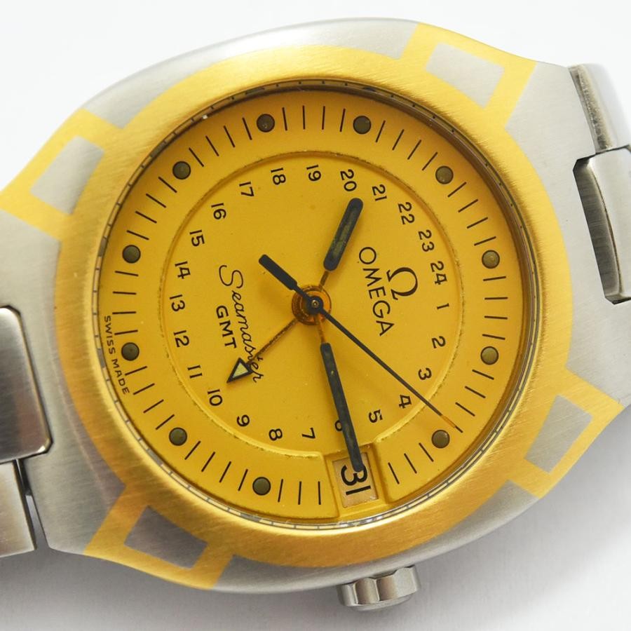 VINTAGE WATCHES FASHION オメガ シーマスター GMT 自動巻き腕時計。鮮やかなイエローの文字盤、ゴールドのアクセント、ステンレススチールブレスレット。