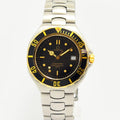 VINTAGE WATCHES FASHIONのオメガ シーマスター プロフェッショナル 200M。ブラック文字盤とゴールドアクセントが映えるステンレス製ダイバーズウォッチ