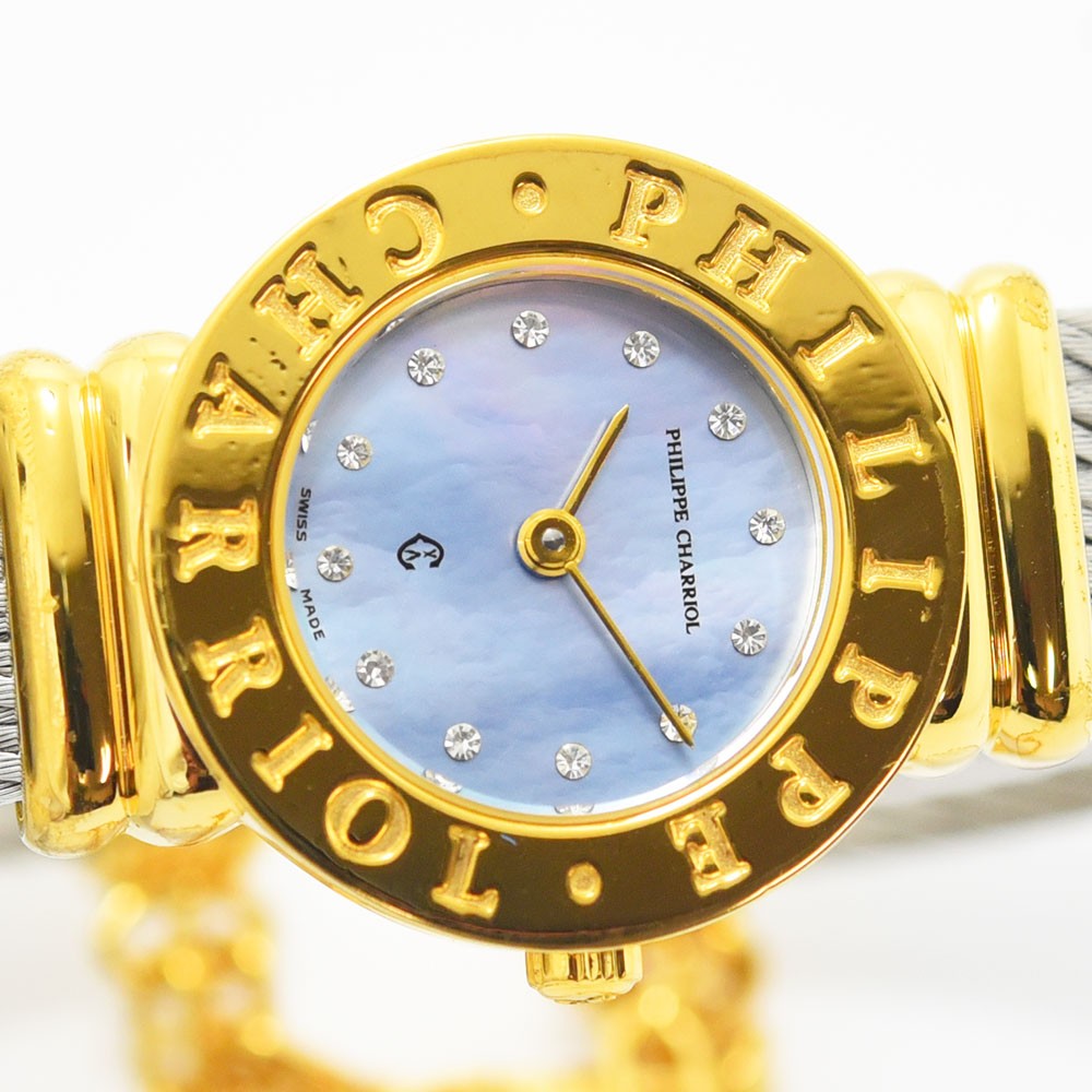 VINTAGE WATCHES FASHIONのフィリップ・シャリオール製レディース腕時計。ゴールドベゼルとマザーオブパールの文字盤にストーンが輝くエレガントなデザイン。