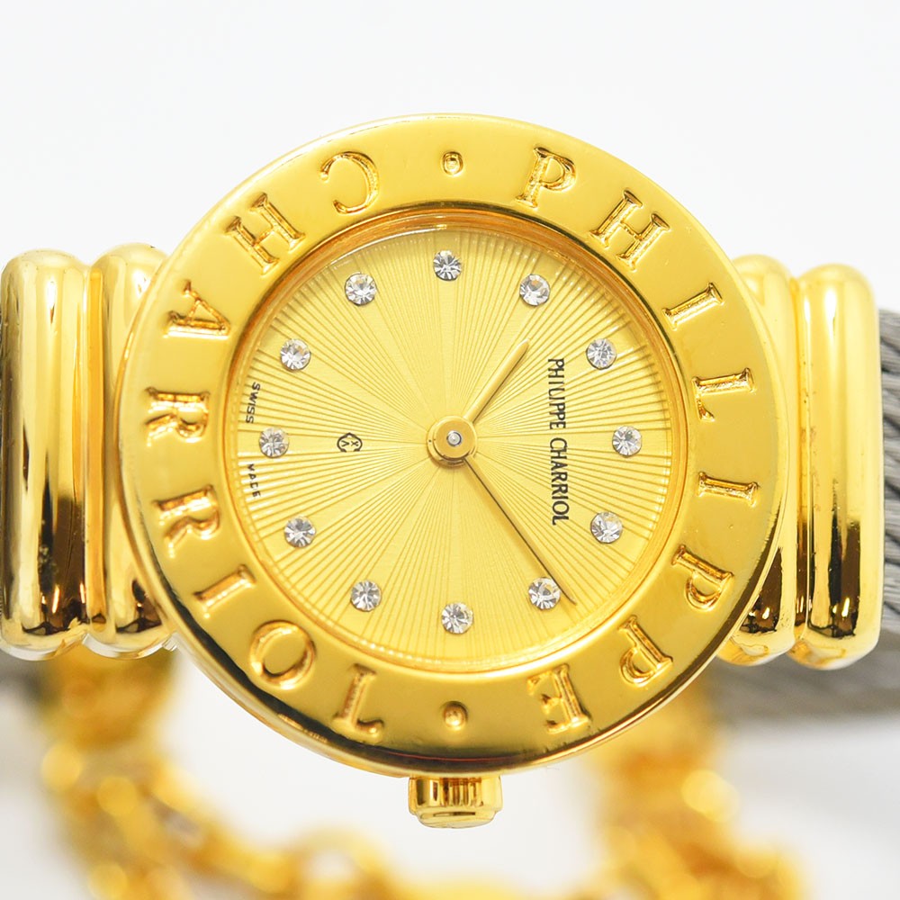 VINTAGE WATCHES FASHIONのPHILIPPE CHARRIOLレディース腕時計。ゴールドの文字盤にストーンが輝くエレガントなワイヤーケーブルブレスレットウォッチ。