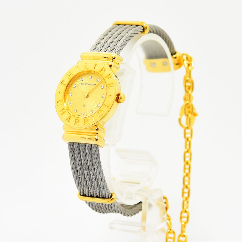 VINTAGE WATCHES FASHIONのPHILIPPE CHARRIOLレディース腕時計。ゴールドの文字盤と特徴的なワイヤーケーブルブレスレットが輝くエレガントなデザイン。