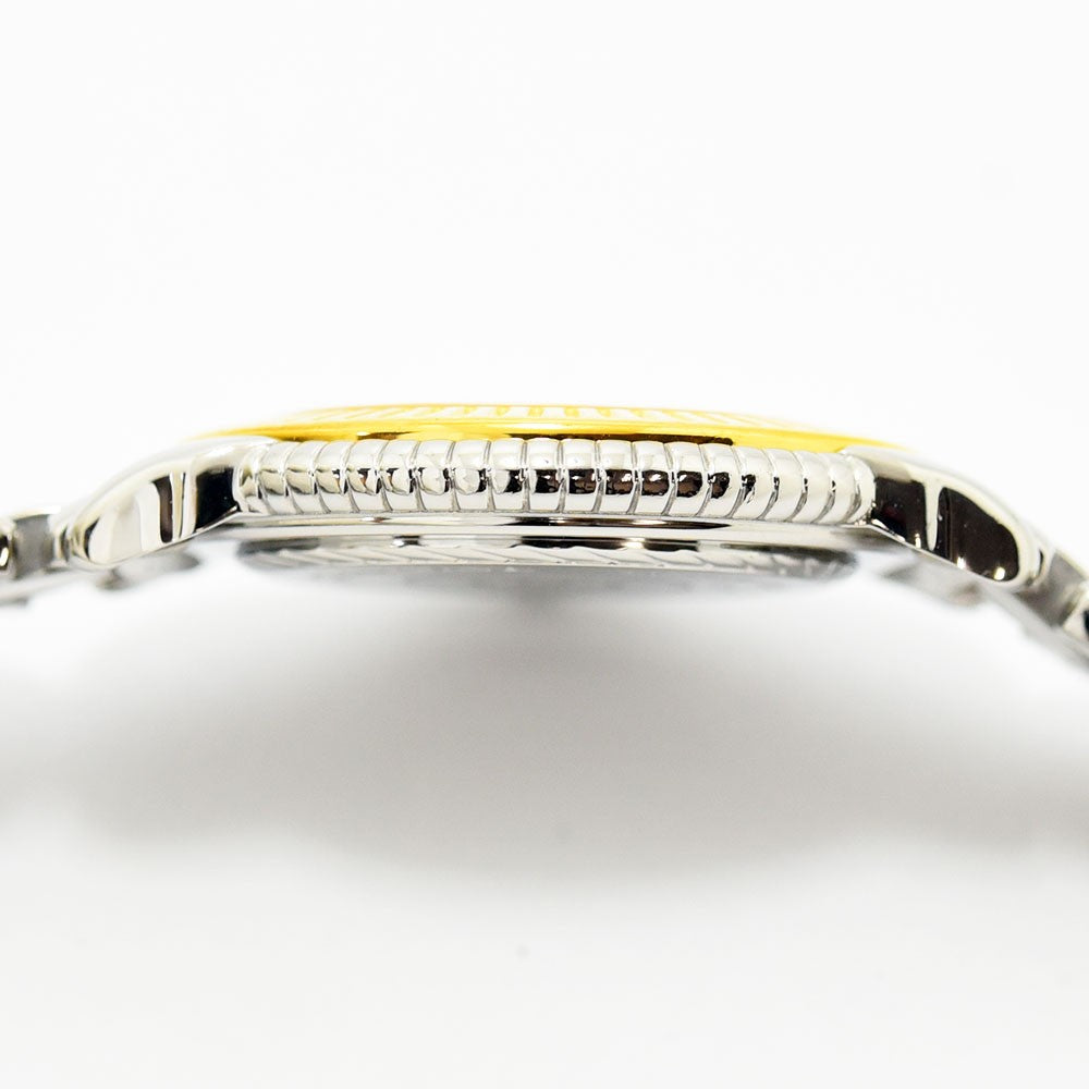 VINTAGE WATCHES FASHIONのフィリップ・シャリオール製ステンレススチール腕時計の側面、ゴールドベゼルとシルバーケース