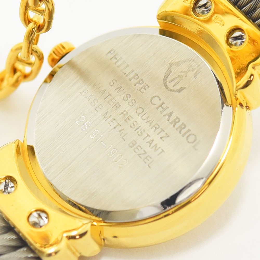 VINTAGE WATCHES FASHIONのフィリップ・シャリオール腕時計の裏蓋。ゴールドとワイヤーケーブルブレスレットのディテール。