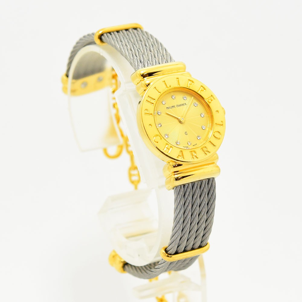 VINTAGE WATCHES FASHIONのPHILIPPE CHARRIOLレディース腕時計。ゴールドの文字盤とワイヤーケーブルブレスレットが特徴的なエレガントなクォーツウォッチ。