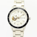 VINTAGE WATCHES FASHION プレザージュ オートマチック ウォッチ。オフホワイトの文字盤、ローマ数字インデックス、オープンハートデザイン、ブラックセラミックベゼル、ステンレススチールブレスレット。